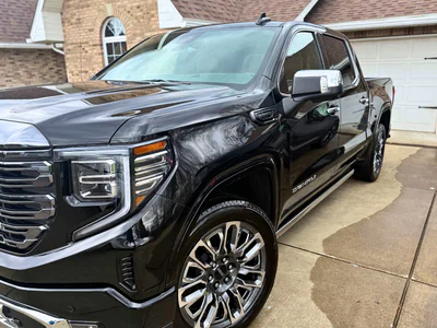 Black GMC commercial truck showing a clean, professional exterior detail