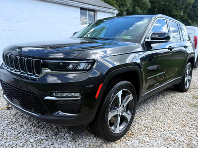 Black Jeep Grand Cherokee with monthly maintenance detailing.