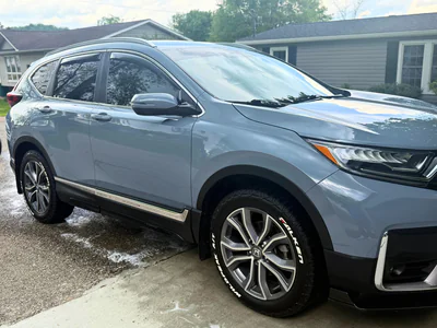 Blue Honda showing complete exterior transformation.