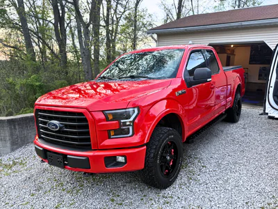 Ceramic coated red Ford F-150 showing brilliant shine and protection