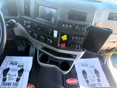 Semi-truck dashboard and interior showing professional cleaning results