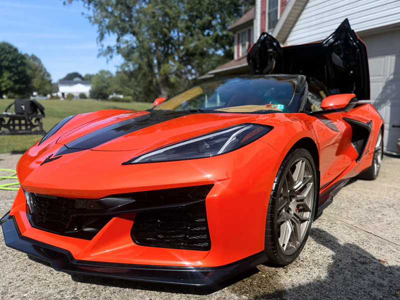 Stunning ceramic coated orange Corvette showcasing premium detailing and paint protection results
