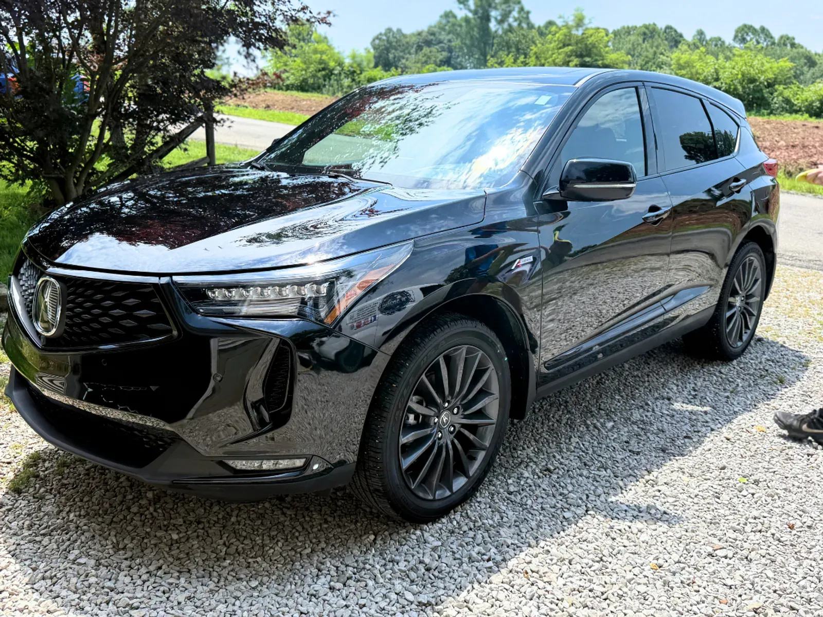 Ceramic coated black Acura showing mirror-like finish