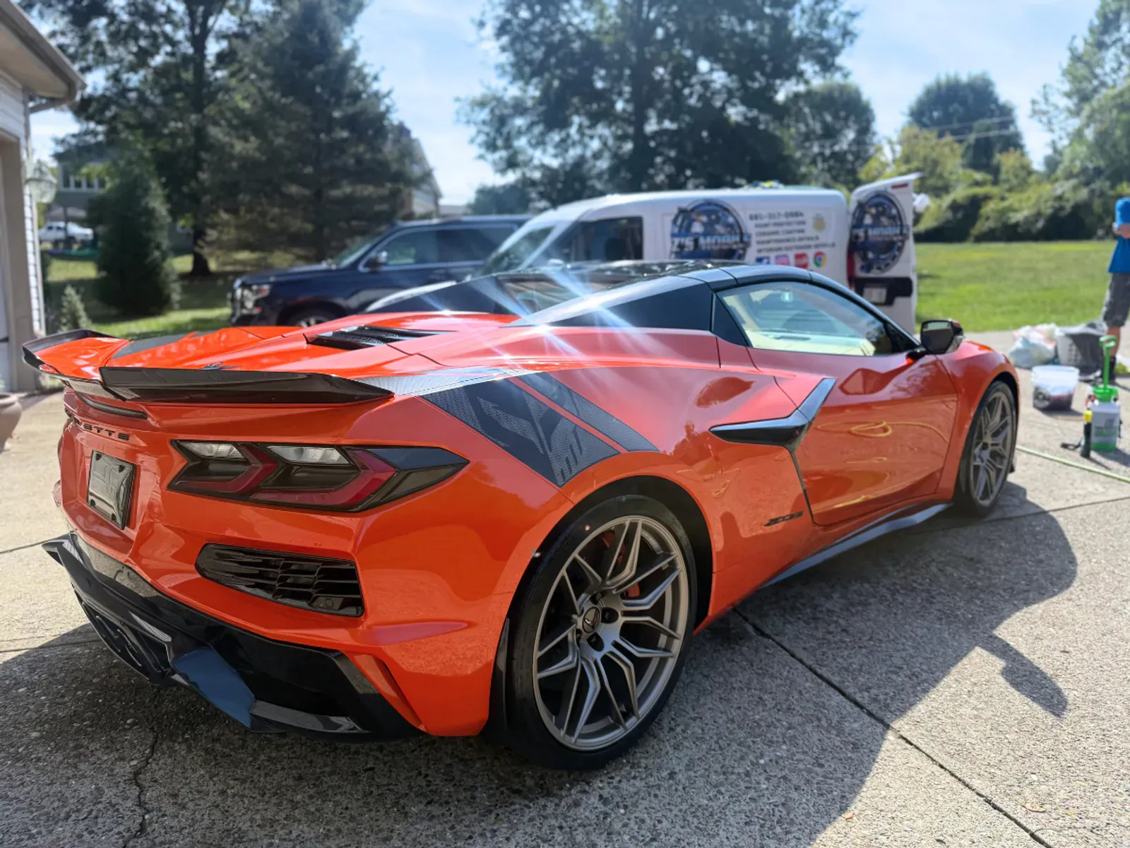 Ceramic coated orange Corvette rear angle showing deep shine