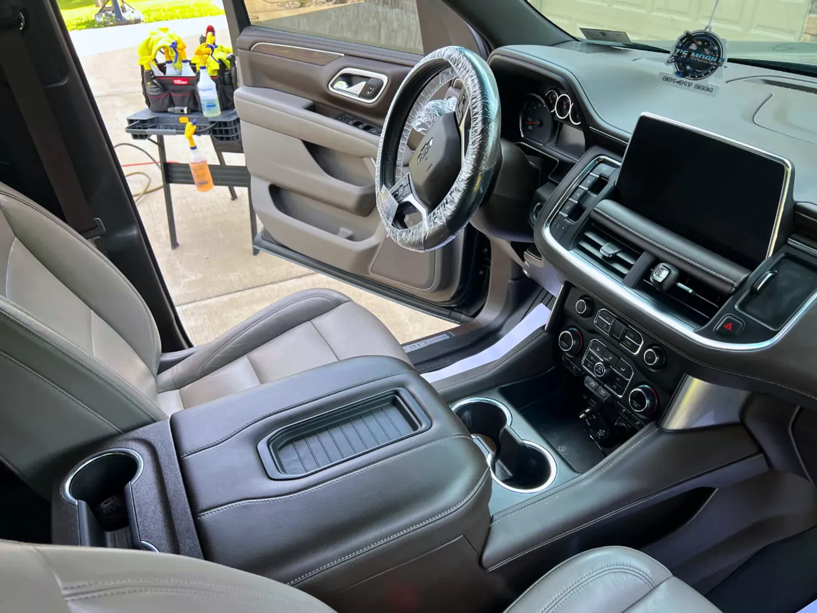 Pristine Chevy interior detailing results with spotless dashboard and steering wheel