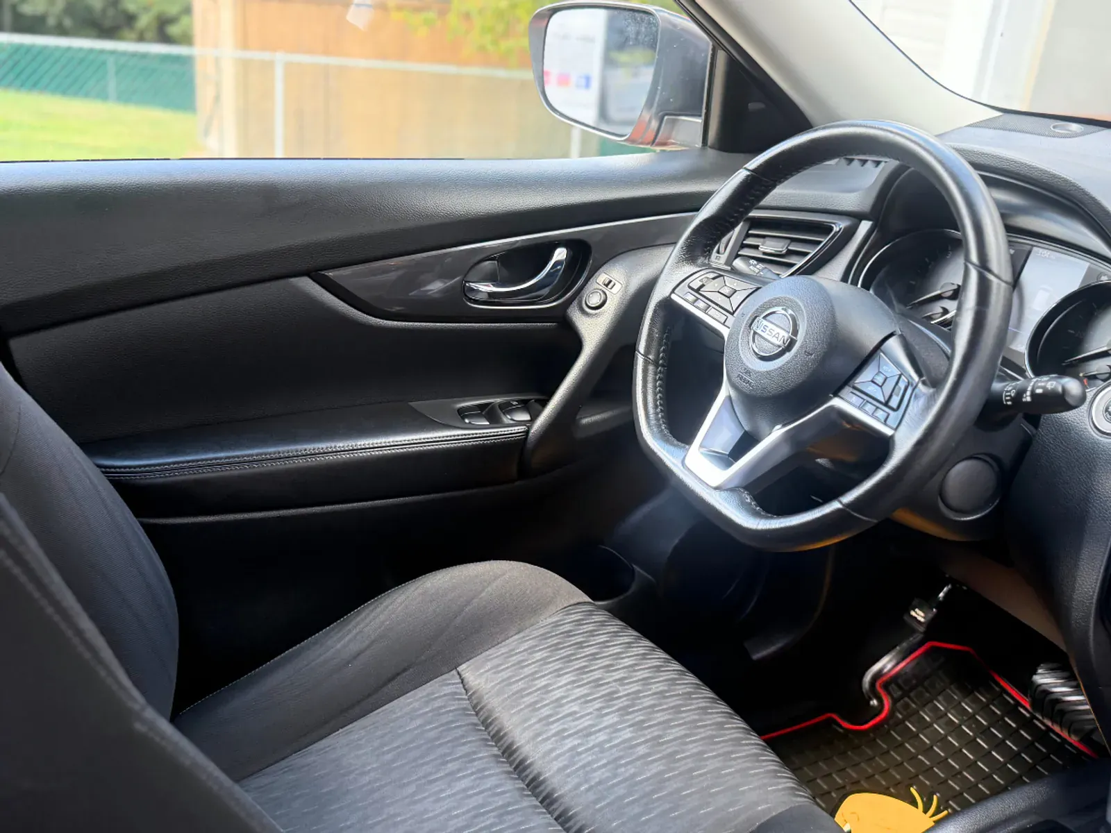 Nissan driver side cabin showing spotless interior detailing
