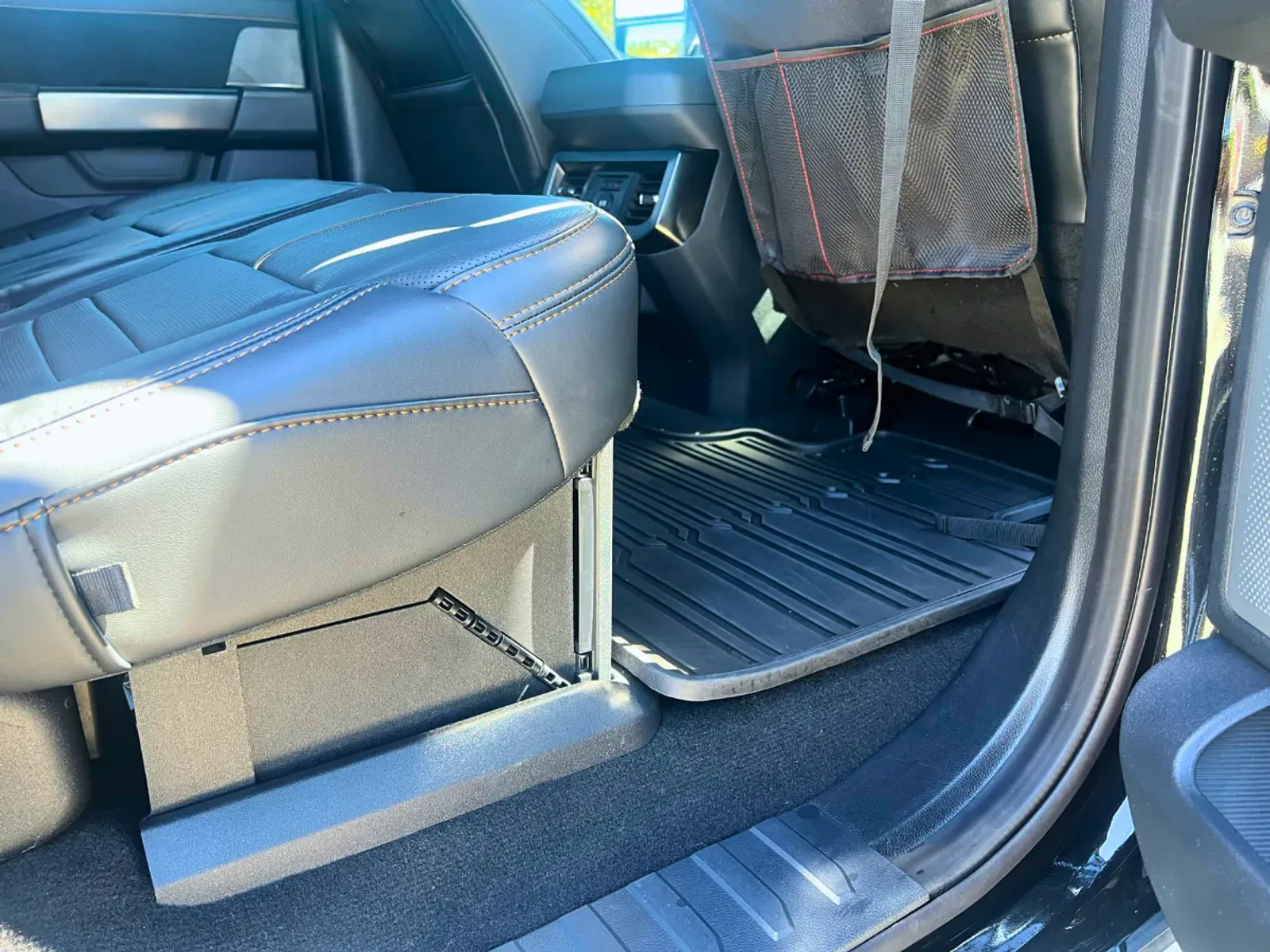 Rear seat interior detailing showing complete cabin transformation