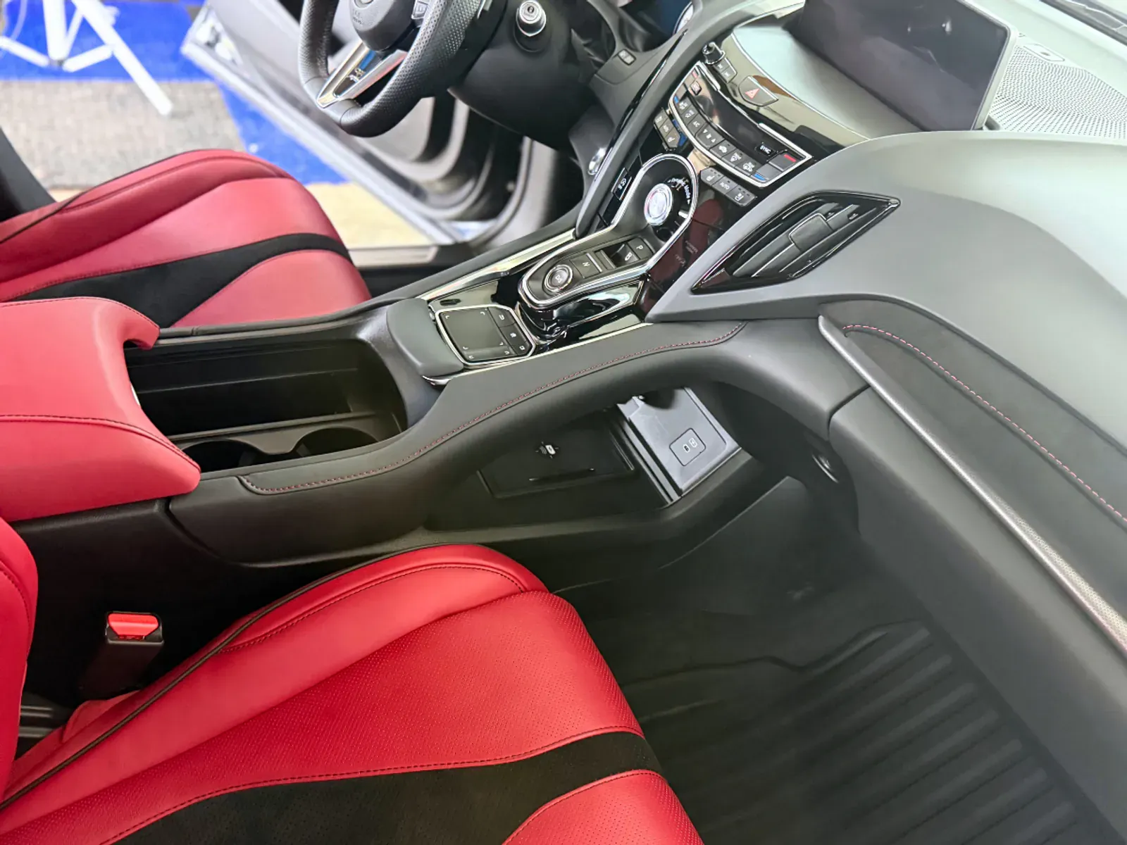 Red interior passenger side showing dashboard and cabin transformation